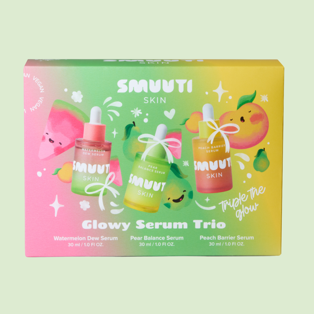 SMUUTI SKIN Glowy Serum Trio set featuring watermelon dew serum, pear balance serum, and peach barrier serum in a pastel pink, green, and yellow gradient packaging.
