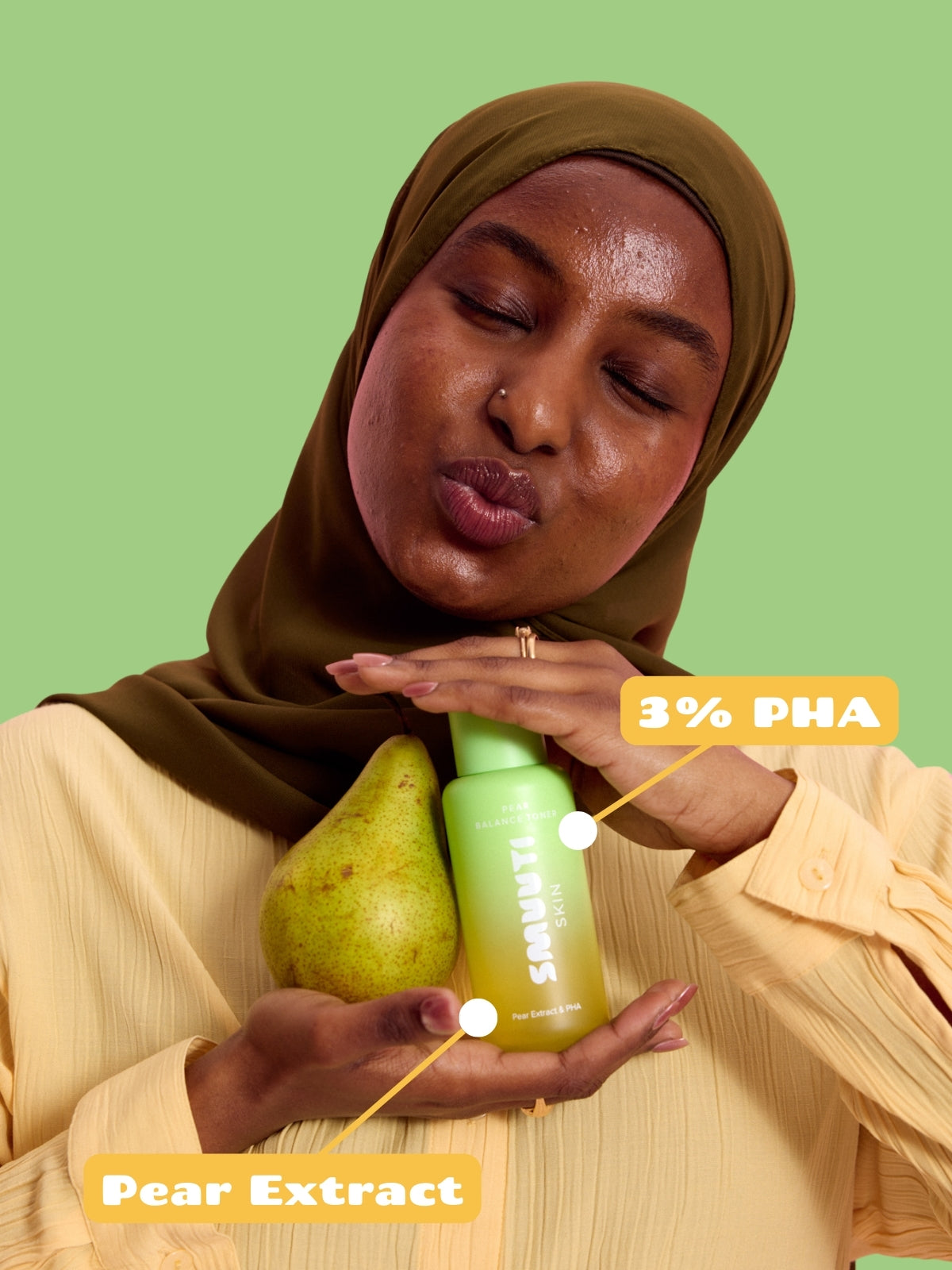 Woman holding a bottle of Smuuti Skin pear balance toner. Image labeled with '3% PHA' and 'Pear Extract' text on a green background