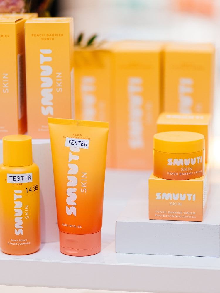 Smuuti Skin peach barrier product testers in a store display