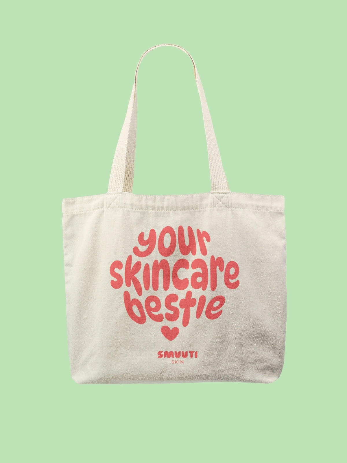 Tote bag with 'your skincare bestie' text on a light green background