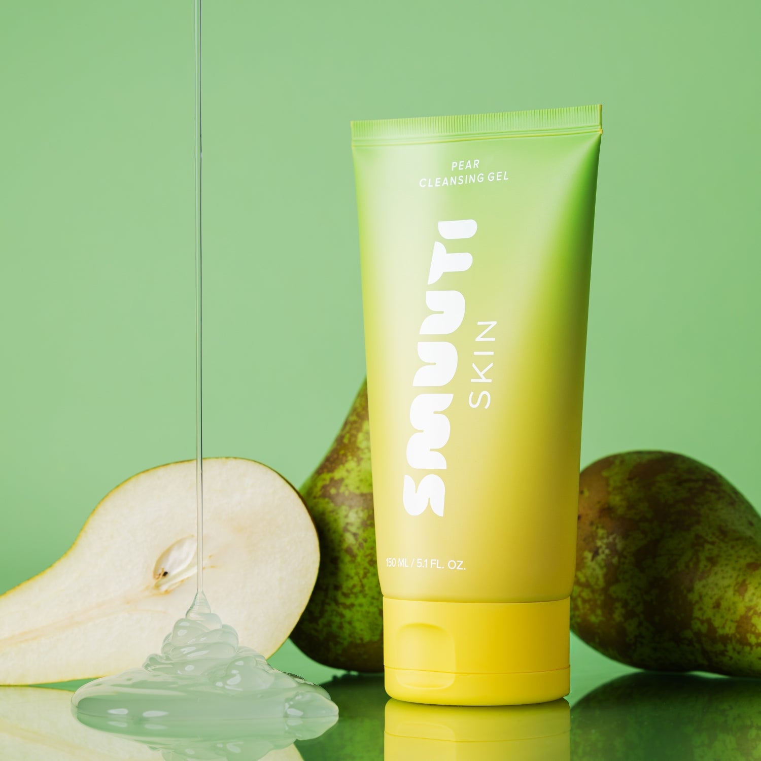 Tube of smuuti skin pear cleansing gel with pears on a green background