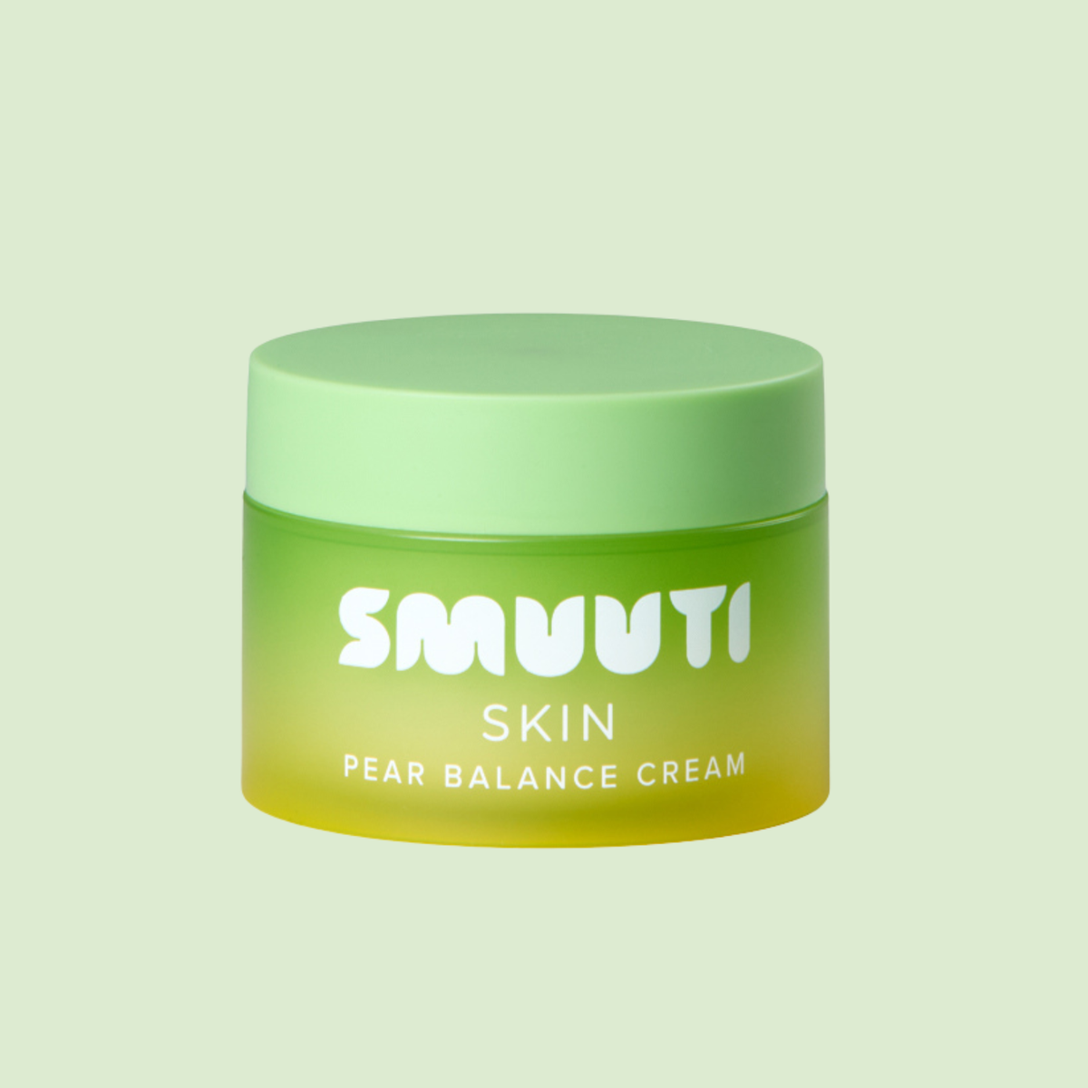 A jar of SMUUTI Skin Pear Balance Cream with a light green lid and a yellow-green gradient container, set against a solid pale green background.