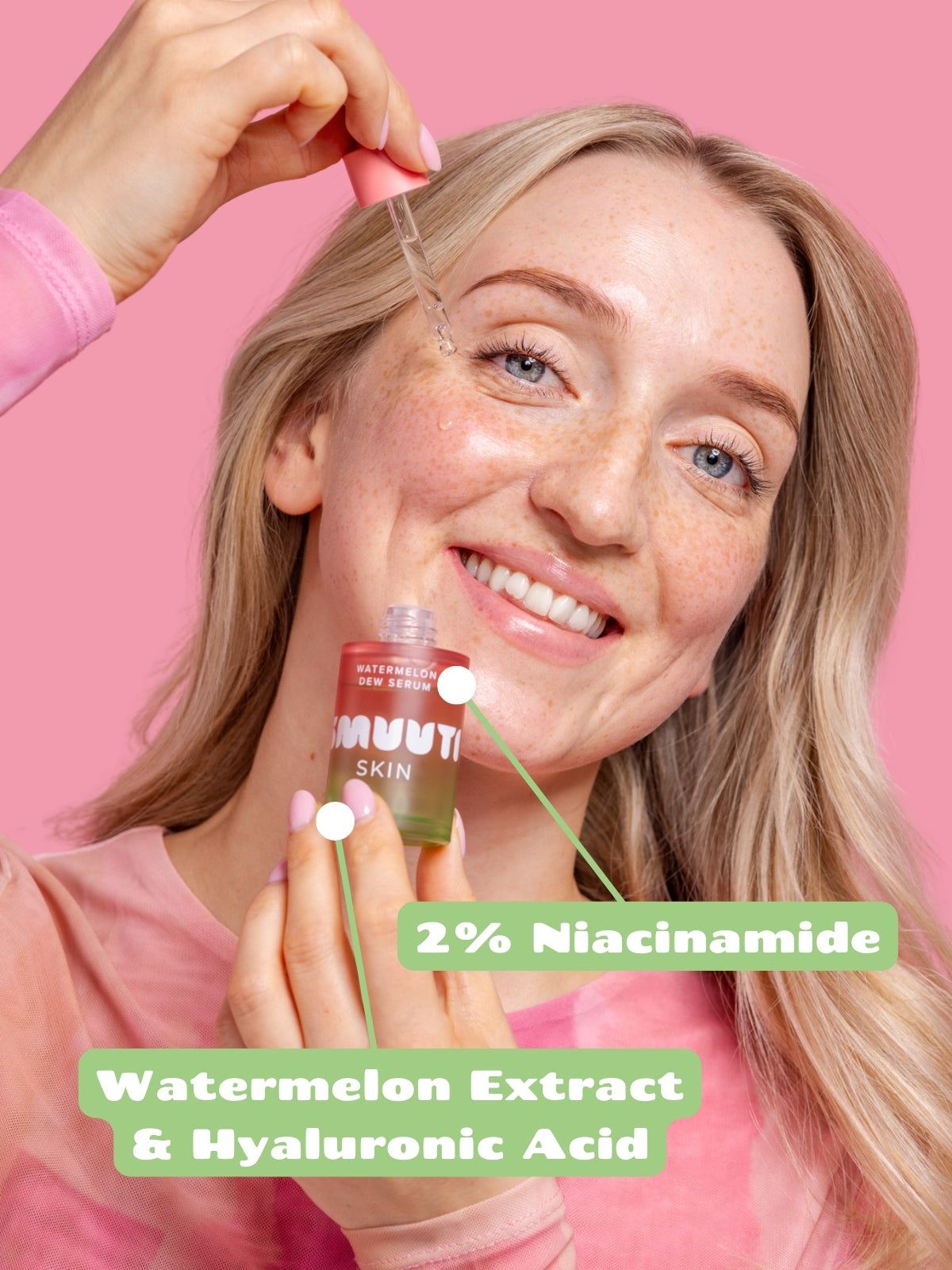 Woman applying Smuuti Skin watermelon dew serum with pink background