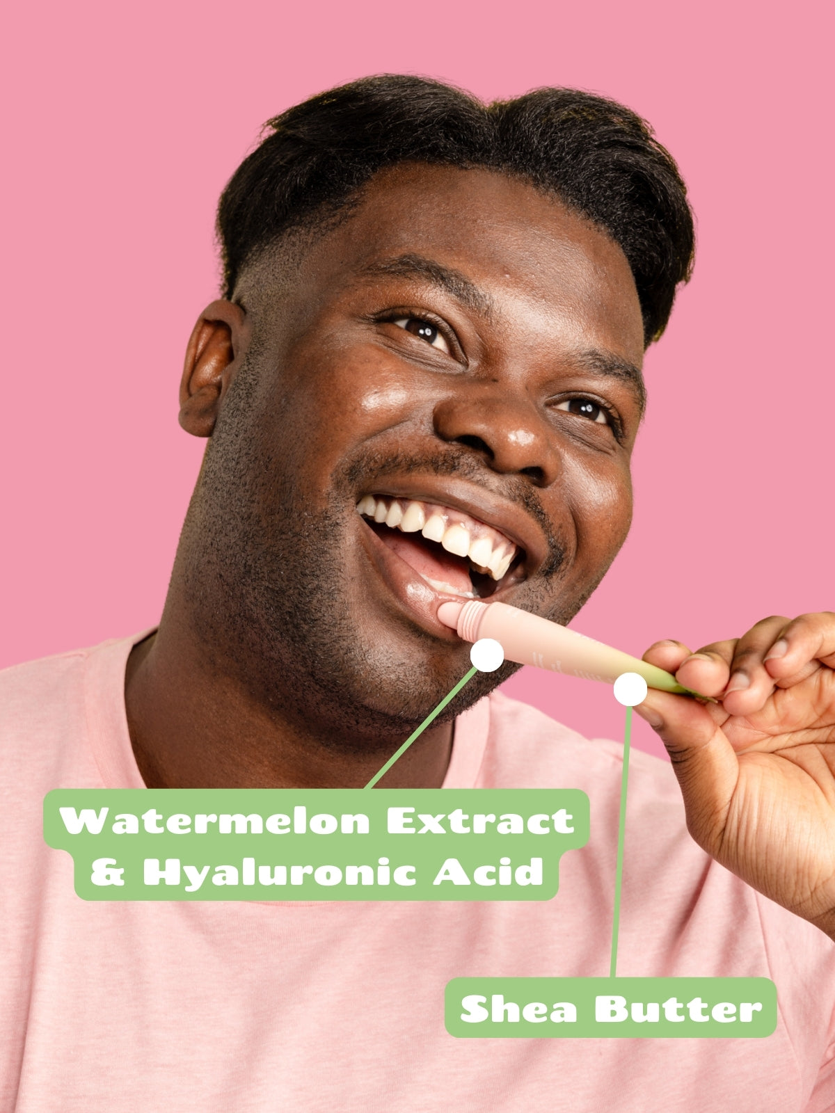 Man using Smuuti Skin watermelon lip mask with text on watermelon extract, hyaluronic acid, and shea butter against a pink background