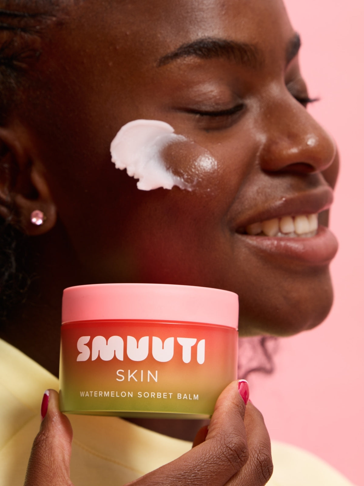 Closeup of the Smuuti Skin watermelon sorbet balm texture on a model's skin