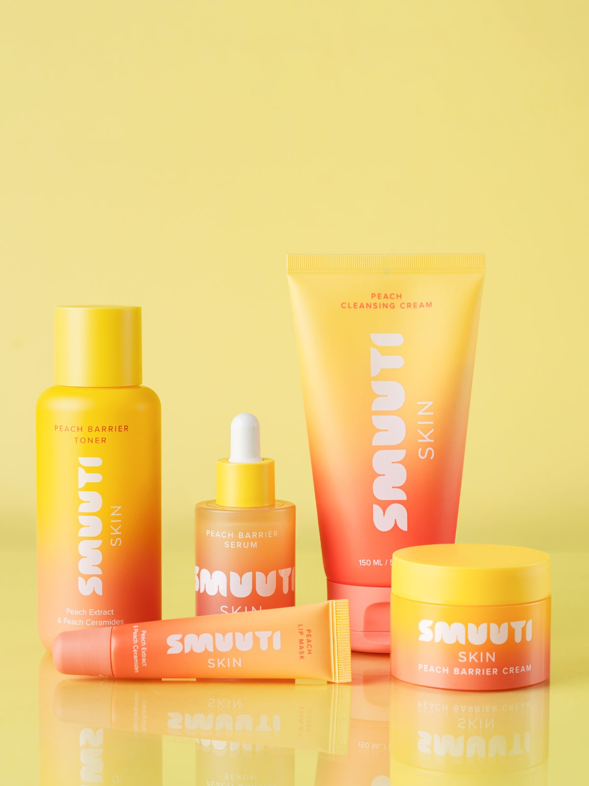 SMUUTI peach barrier skincare products on a yellow background