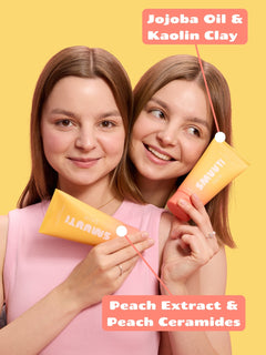 Two women holding Smuuti Skin peach cleansing cream with text about ingredients on a yellow background