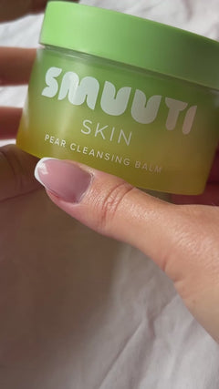 closeup video of Smuuti Skin pear cleansing balm on a textured surface