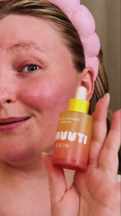 video of person applying and showcasing peach barrier serum