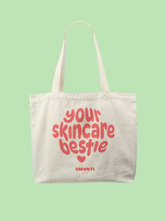 Tote bag with 'your skincare bestie' text on a light green background