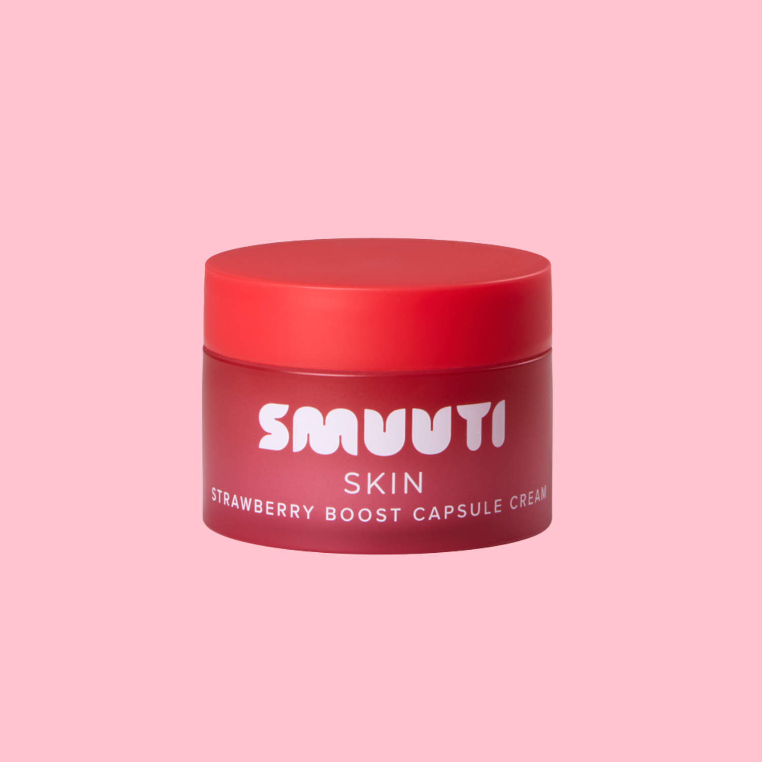 A red cosmetic jar labeled 'SMUUTI SKIN Strawberry Boost Capsule Cream' centered on a solid pink background.