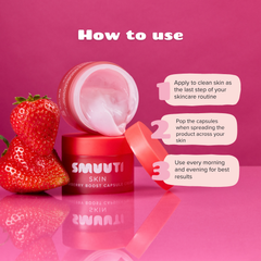 SMUUTI Skin Strawberry Boost Capsule Cream jar shown with strawberries on a pink background, with a 'How to use' instruction graphic and three numbered steps on the right.
