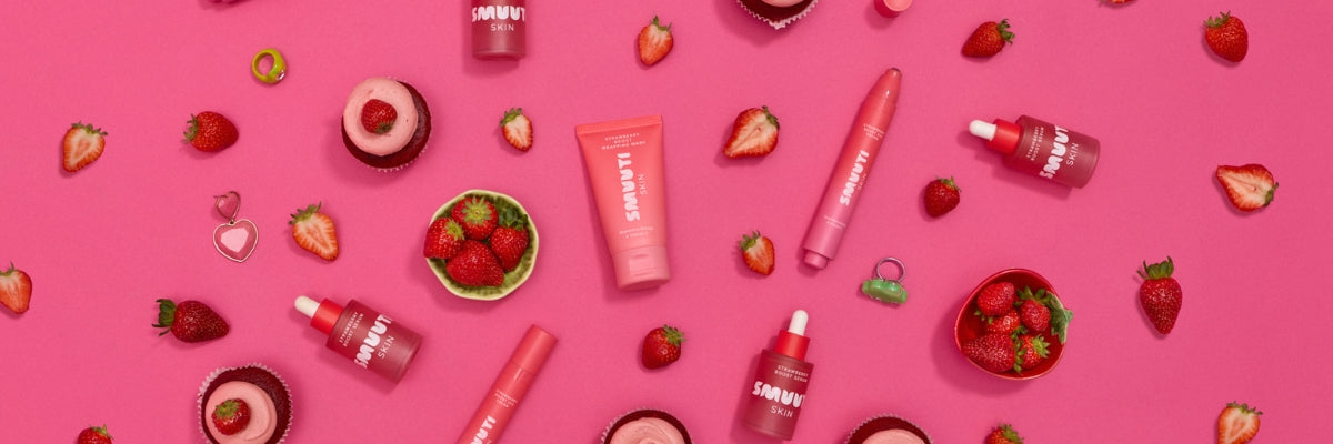 Smuuti Skin strawberry boost products with strawberries on a pink background