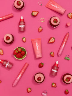 Smuuti Skin strawberry boost products with strawberries on a pink background